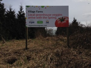 Coloured Horizontal Village Farms Sign Street View