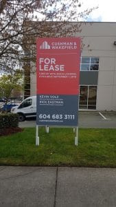 Coloured Verticle For Lease Cushman & Wakefield Signs Street View