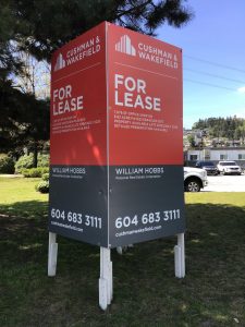 Coloured Verticle For Lease Cushman & Wakefield Signs Street View